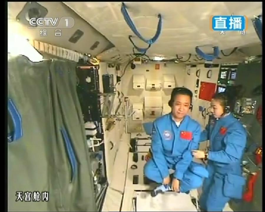This TV grab taken on June 20, 2013 shows female astronaut Wang Yaping (R), one of the three crew members of Shenzhou-10 spacecraft, giving a lecture to students on Earth aboard China's space module Tiangong-1. This TV grab taken on June 20, 2013 shows female astronaut Wang Yaping (R), one of the three crew members of Shenzhou-10 spacecraft, giving a lecture to students on Earth aboard China's space module Tiangong-1.