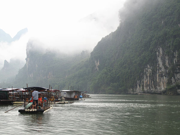 Boats prepare to travel along the Lijiang River which belongs to the Pearl River system. With mountains and waters in the landscape, it is the essence of Guilin scenery of the Guangxi Zhuang Autonomous Region. [CnDG by Jiao Meng]