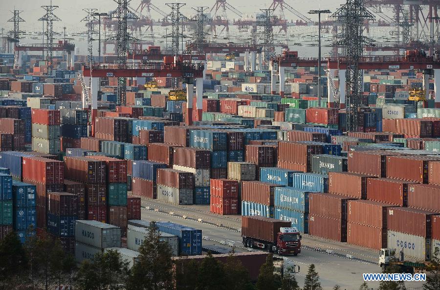 Photo taken on Oct. 14, 2013 shows the container terminal in Waigaoqiao Free Trade Zone in east China&apos;s Shanghai municipality.