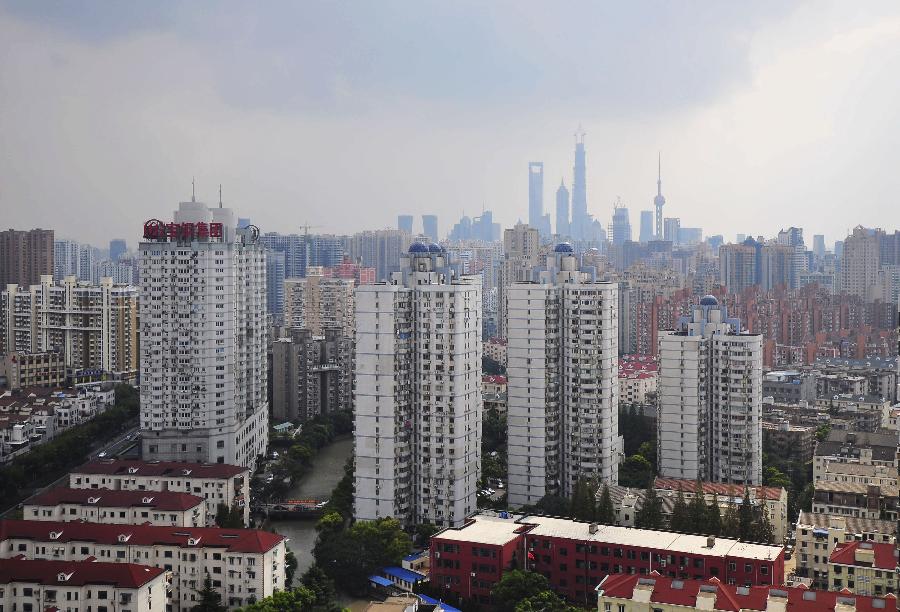 Residential buildings are seen in Hongkou District, east China&apos;s Shanghai, Oct. 22, 2013. 
