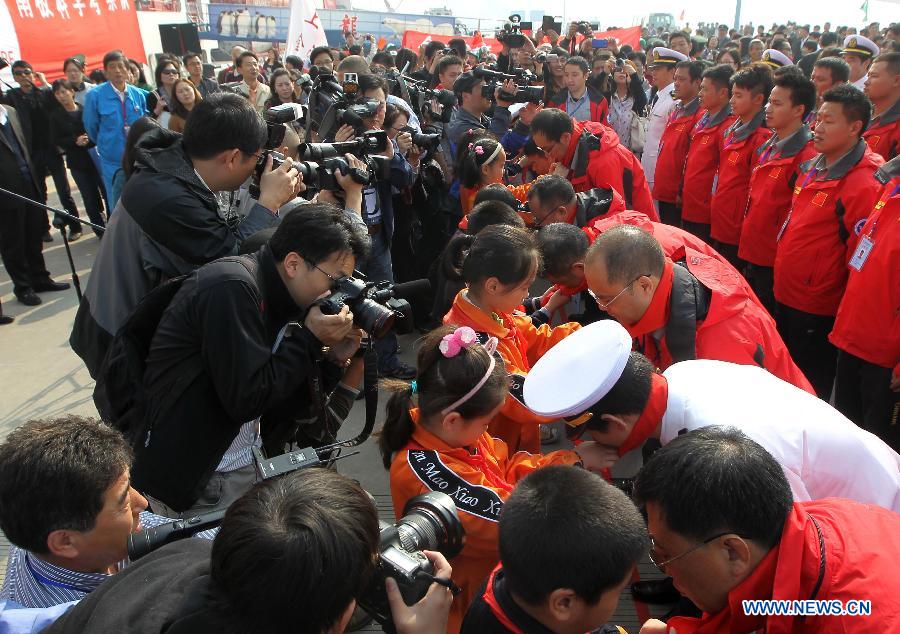 A ceremony is held to send off the Chinese research vessel and icebreaker Xuelong (Snow Dragon) at a dock in Shanghai, east China, Nov. 7, 2013.