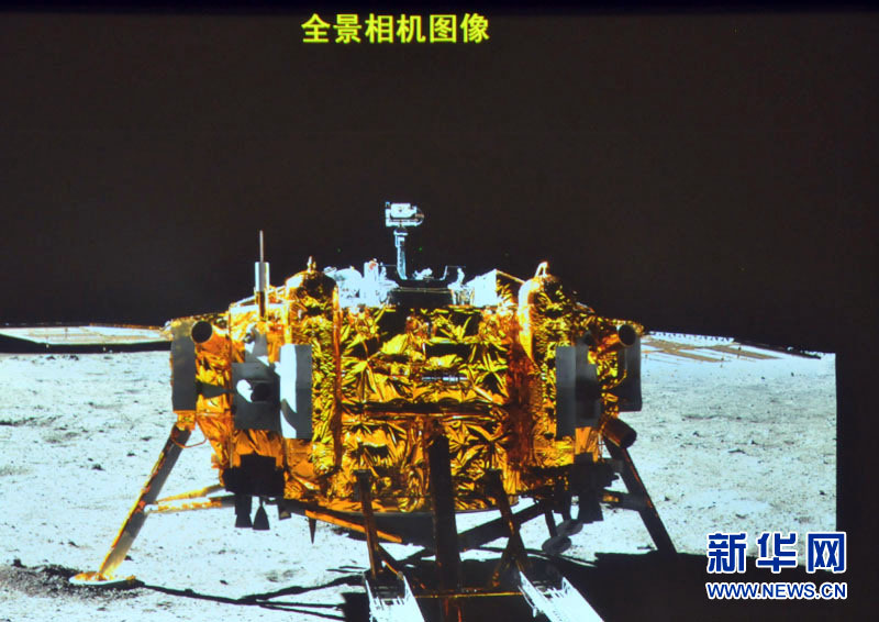 Screen shows the photo of the Yutu moon rover taken by the camera on the Chang'e-3 moon lander during the mutual-photograph process, at the Beijing Aerospace Control Center in Beijing, capital of China, Dec. 15, 2013. The moon rover and the moon lander took photos of each other Sunday night, marking the complete success of the Chang'e-3 lunar probe mission. (Xinhua)