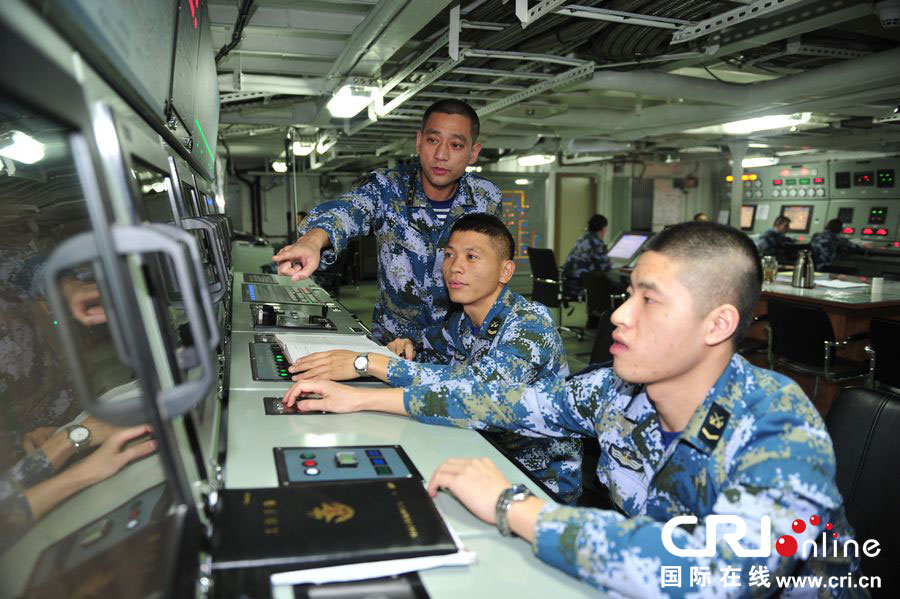 China's first aircraft carrier, the Liaoning, has conducted more than 100 tests and training tasks since early December, when it began a training mission in the South China Sea, the navy said on Sunday. Dec. 22, 2013. [Photo/CRI]