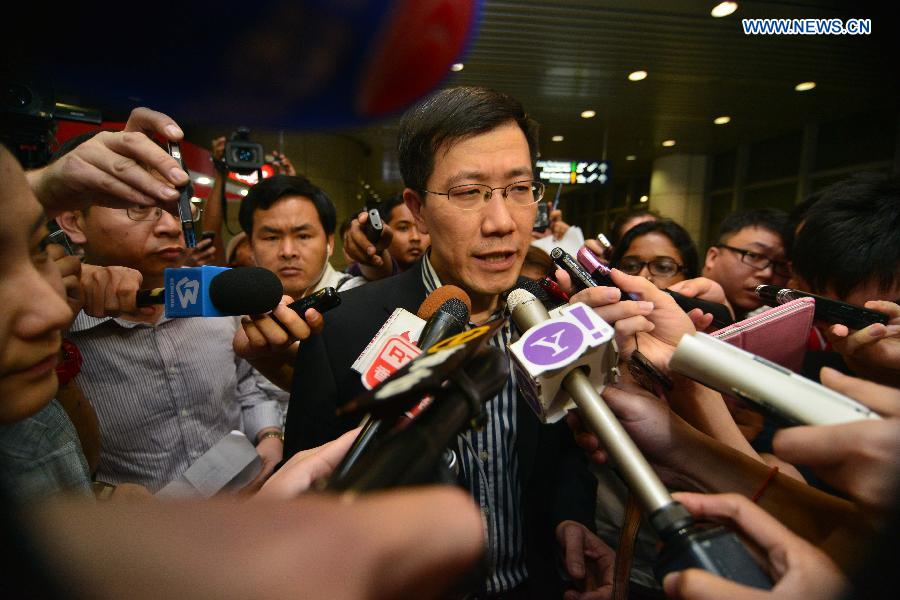 Guo Shaochun (C), head of a joint working group in charge of the missing Malaysia Airlines flight incident, receives interview at the International Airport of Kuala Lumpur in Sepang, Malaysia, on March 10, 2014. 