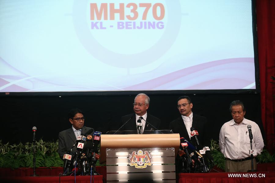 Malaysian Prime Minister Najib Razak speaks during a press conference in Kuala Lumpur, Malaysia, March 24, 2014. New analysis of statellite data suggested that the missing Malaysia Airlines Flight MH370 'ended' in the southern Indian Ocean, said Malaysian Prime Minister Najib Razak on Monday. 
