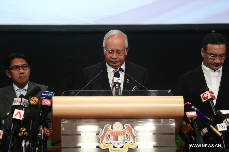 Malaysian Prime Minister Najib Razak speaks during a press conference in Kuala Lumpur, Malaysia, March 24, 2014. New analysis of statellite data suggested that the missing Malaysia Airlines Flight MH370 'ended' in the southern Indian Ocean, said Malaysian Prime Minister Najib Razak on Monday. 