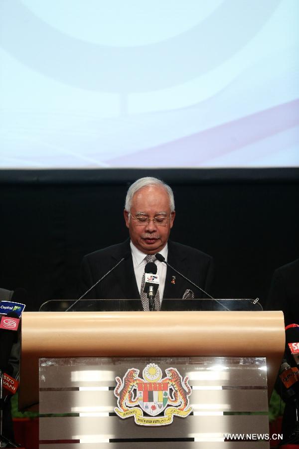 Malaysian Prime Minister Najib Razak speaks during a press conference in Kuala Lumpur, Malaysia, March 24, 2014. New analysis of statellite data suggested that the missing Malaysia Airlines Flight MH370 'ended' in the southern Indian Ocean, said Malaysian Prime Minister Najib Razak on Monday. 