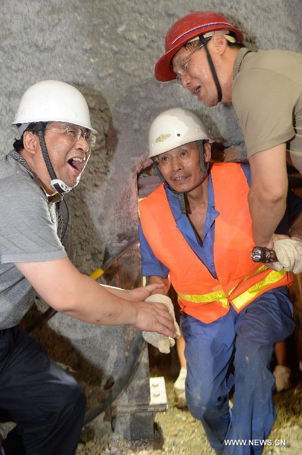 Fourteen workers were rescued out of the tunnel collapse in Yunnan at early hours of Sunday after more than five days of rescue operation. The survivors were sent to a hospital nearby for medical treatment and psychological counseling according to their conditions, local authorities said. However, one person remains missing and the rescue operation continues.
