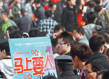 A job fair was held in Kuerle, Xinjiang Uygur autonomous region in March. More than 120 companies offered 2,000 jobs covering marketing, design and management. Que Hure / for China Daily