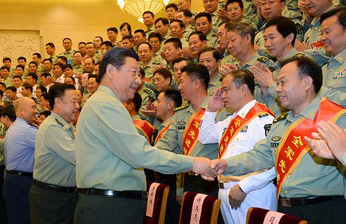 Chinese President Xi Jinping meets with PLA chiefs of staff in Beijing on Monday, September 22, 2014. [Photo: Xinhua]