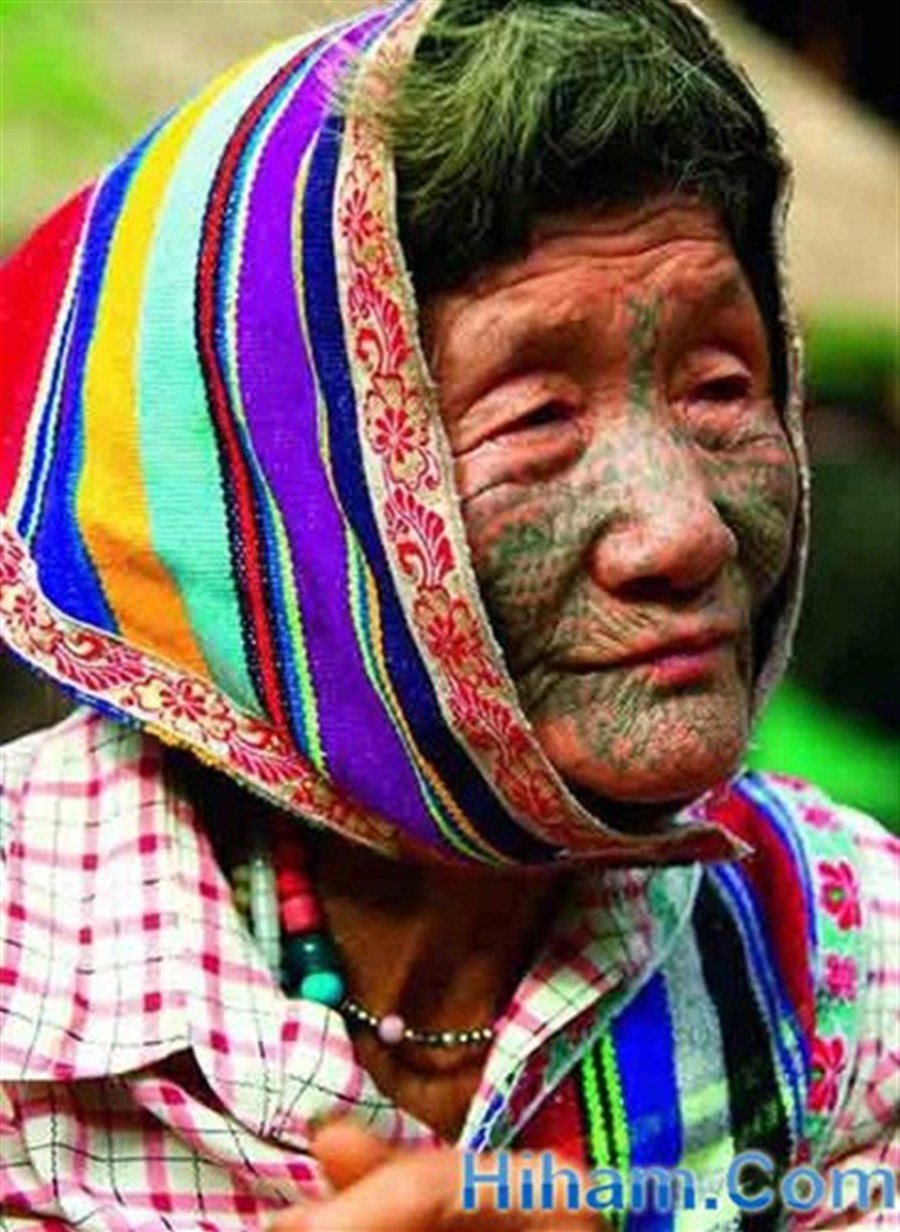 Women of the Dulong Ethnic group with facial tattoos. 