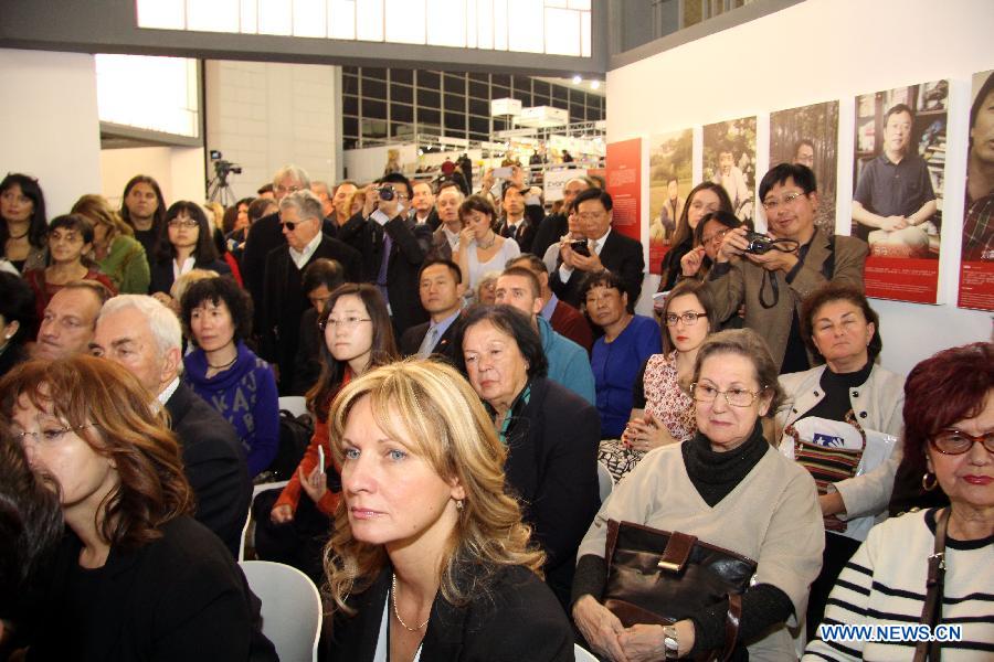 Guests attend the opening ceremony of China section during the 59th Belgrade Book Fair, in Belgrade, Serbia, Oct. 26, 2014. China took part in the book fair that kicked off on Sunday as this year&apos;s host country. [Xinhua]