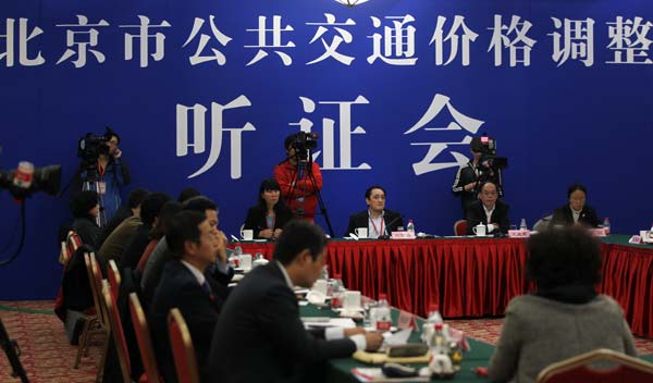 A public hearing on proposed price changes for Beijing public tranportation system is held in Beijing, Oct 28, 2014.[Photo by Zou Hong/asianewsphoto]
