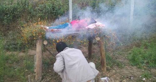 The father burns herbs to try to cure his daughter, Nov 25