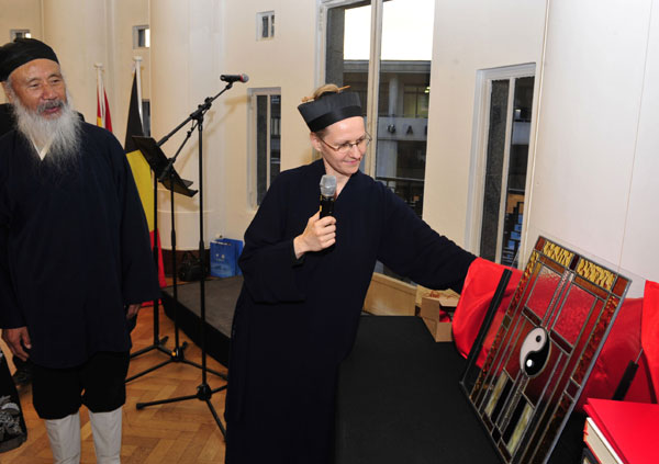 Representatives from Taoist associations in Belgium and China share interpretations of Taoist culture during a visit to Belgium in 2013. YE PINGFAN/XINHUA