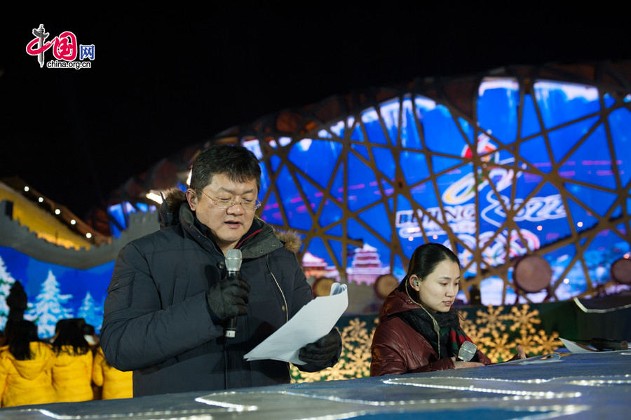 The New Year celebration 'Countdown to 2015' holds its last rehearsal at Beijing's Olympic Park, where the national symbols of the Bird's Nest stadium and the Water Cube National Aquatics Center are located, on Tuesday, Dec. 30, 2014. The ceremony also features the Chinese capital's bidding for the 2022 Winter Olympics. China Central Televsion's renowned sports presenter is to host the ceremony. [Photo by Chen Boyuan / China.org.cn]