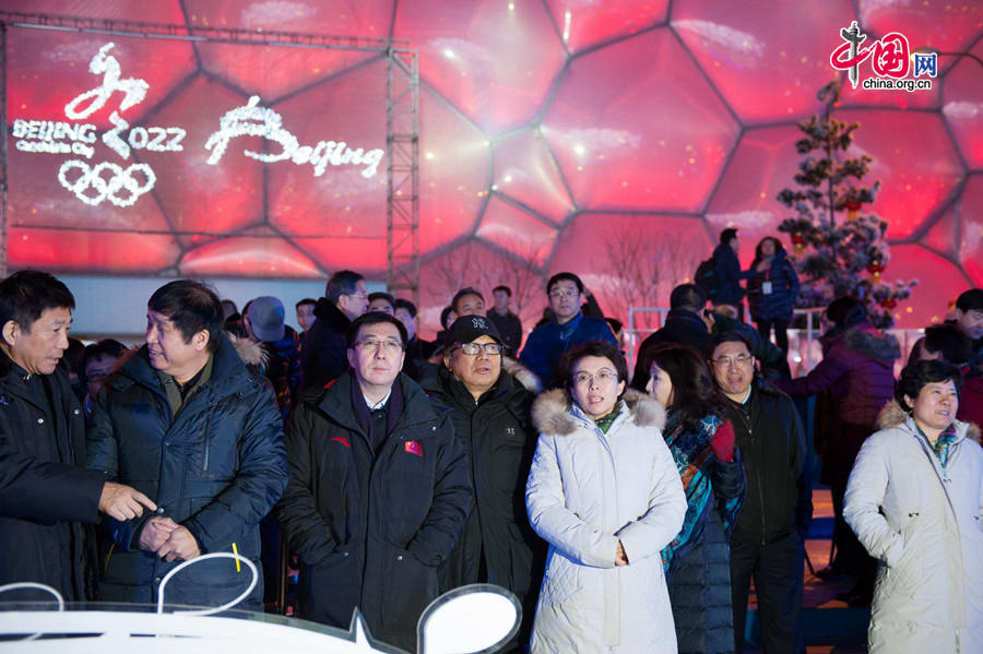 The New Year celebration 'Countdown to 2015' holds its last rehearsal at Beijing's Olympic Park, where the national symbols of the Bird's Nest stadium and the Water Cube National Aquatics Center are located, on Tuesday, Dec. 30, 2014. The ceremony also features the Chinese capital's bidding for the 2022 Winter Olympics. China Central Televsion's renowned sports presenter is to host the ceremony. [Photo by Chen Boyuan / China.org.cn]