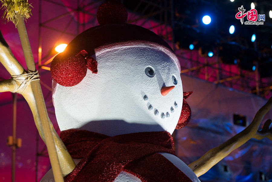 The New Year celebration 'Countdown to 2015' holds its last rehearsal at Beijing's Olympic Park, where the national symbols of the Bird's Nest stadium and the Water Cube National Aquatics Center are located, on Tuesday, Dec. 30, 2014. The ceremony also features the Chinese capital's bidding for the 2022 Winter Olympics. [Photo by Chen Boyuan / China.org.cn]