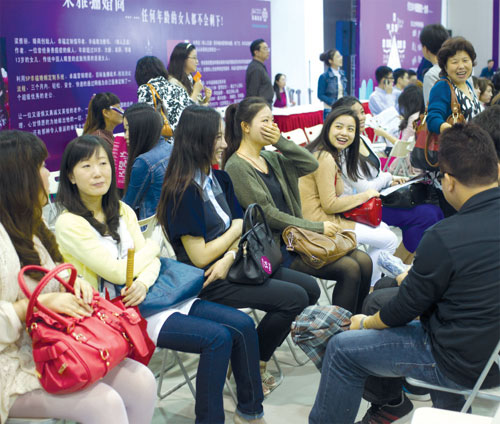 A group of women attend a matchmaking event in Shanghai. [Gao Erqiang / China Daily] 