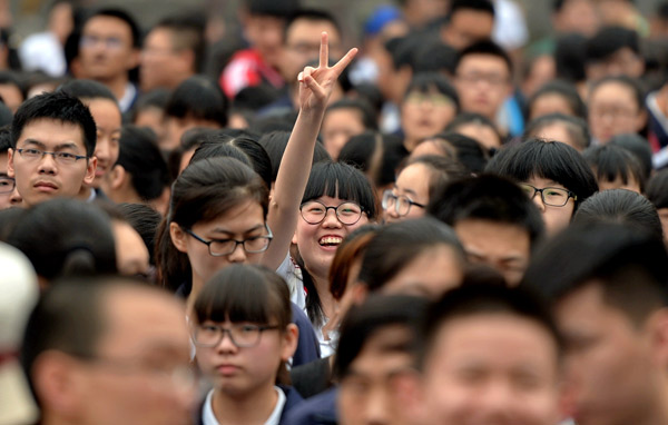 Students leave a gaokao venue in Xingtai, Hebei province, after their first exam on Tuesday.[Photo/Xinhua]