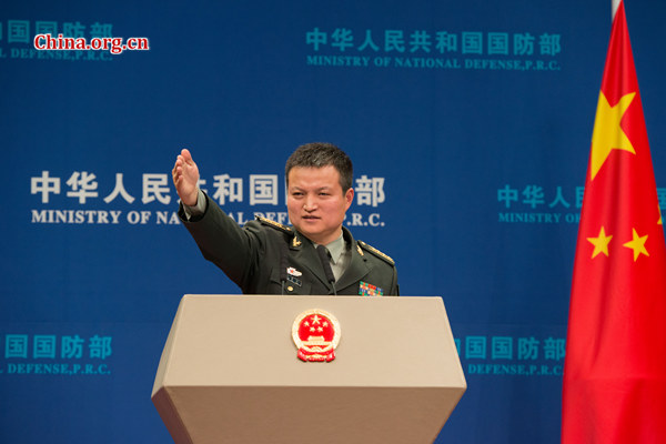 Senior Colonel Yang Yujun, spokesperson for China's Ministry of National Defense (MOD), takes questions at a routine press briefing on Wednesday. [Photo by Chen Boyuan / China.org.cn]