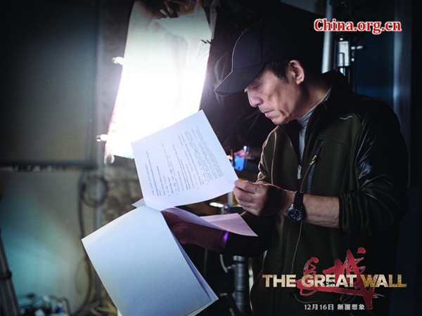 Zhang Yimou is studying the script of 'The Great Wall' in an undated photo. [Photo provided to China.org.cn]