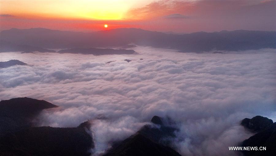 Sea of clouds over meadows in NW China's Shaanxi