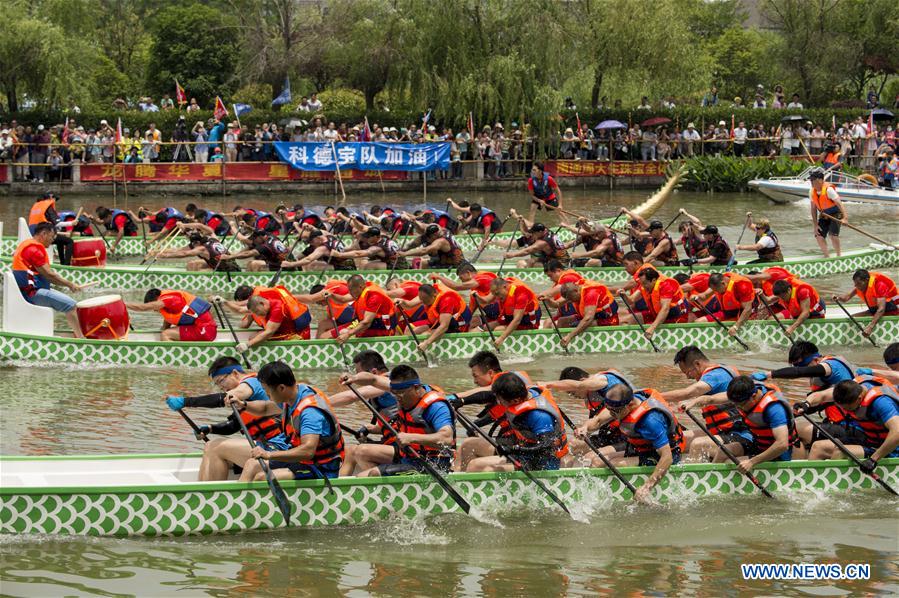 Dragon boat races held across China to celebrate Duanwu FestivalN)